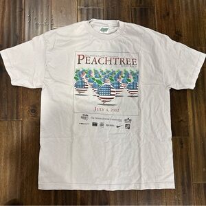 Vintage 2002 Nike Peachtree Road Race Graphic T-Shirt